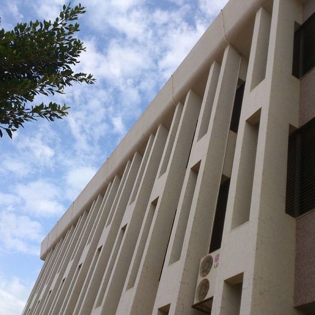 architecture, low angle view, built structure, building exterior, sky, cloud - sky, building, city, modern, office building, tall - high, day, cloud, outdoors, no people, tower, cloudy, skyscraper, architectural feature, pattern