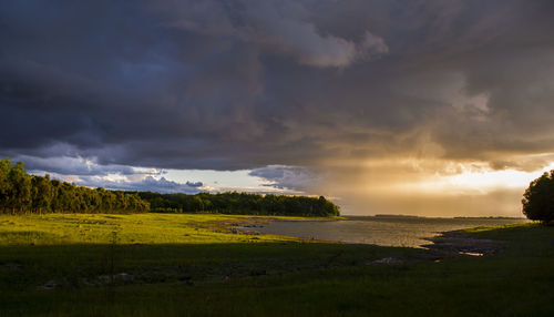 Scenic view of sea against sky during sunset