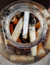 High angle view of cigarette in container