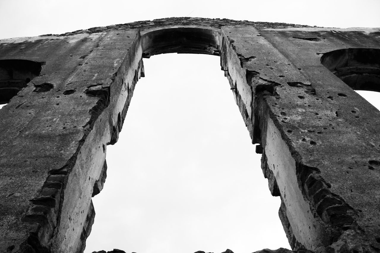 LOW ANGLE VIEW OF OLD RUINS AGAINST SKY