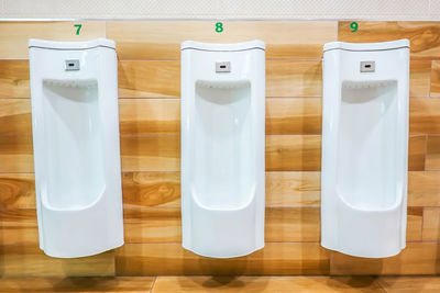 Urinals in public restroom