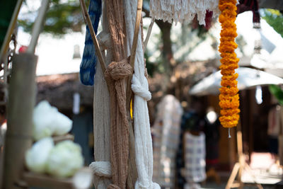 Close-up of tied hanging at market stall