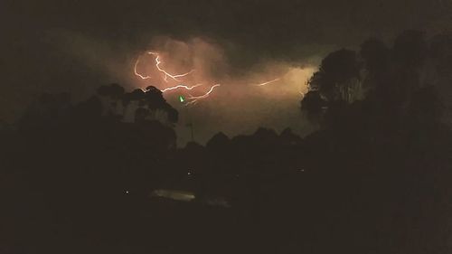 Lightning strike against dramatic sky