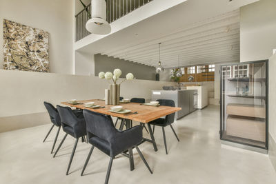 Empty chairs and table in cafe