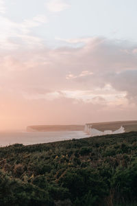 Scenic view of landscape against sky during sunset