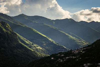 Layers of mountains in sunset light near lake como / lago di como, italy.