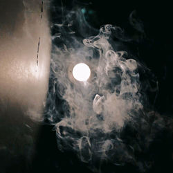 Close-up of smoke against black background