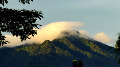 Scenic view of mountains against sky during sunset