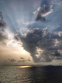 Scenic view of sea against cloudy sky