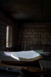 Close-up of book on table in classroom