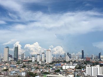 Modern buildings in city against sky