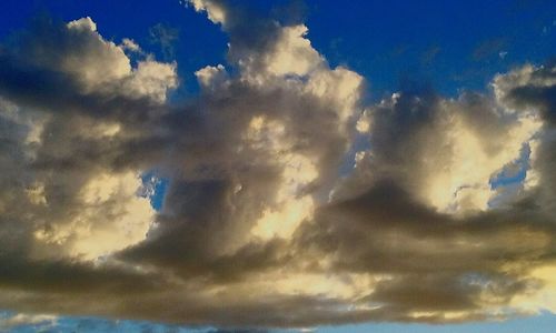 Low angle view of clouds in sky during sunset