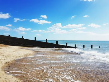 Scenic view of beach against sky