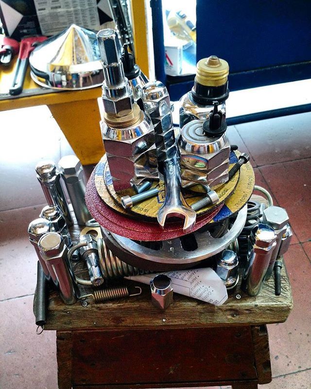 indoors, table, still life, metal, wood - material, empty, no people, absence, high angle view, chair, container, close-up, day, metallic, bottle, old-fashioned, focus on foreground, machinery, equipment, sunlight