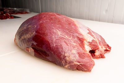Close-up of meat on cutting board