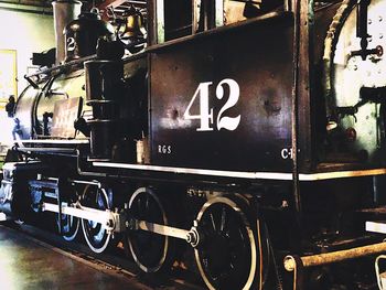 Close-up of old train at railroad station