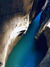 High angle view of rock formation in sea