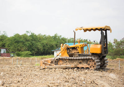 View of machinery at construction site against sky