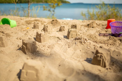 Hooded beach chairs on sand