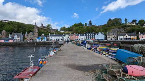 Boats moored at harbor