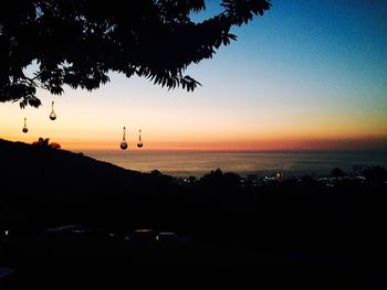 Scenic view of sea against sky at sunset