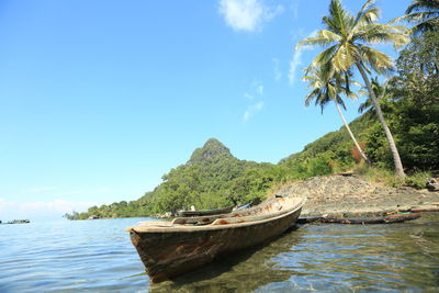 Boat in sea against sky