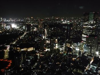 Illuminated cityscape at night