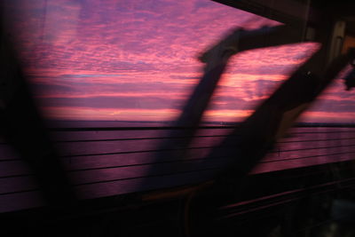 Blurred motion of train window at sunset