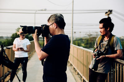 Young couple photographing