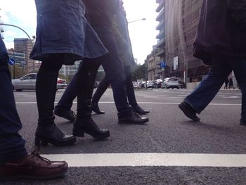 Low section of people on zebra crossing