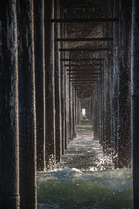 Pier over sea by building