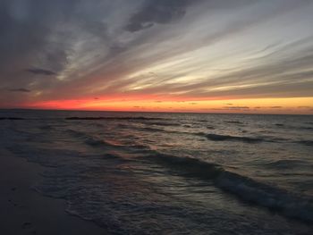 Scenic view of sea at sunset