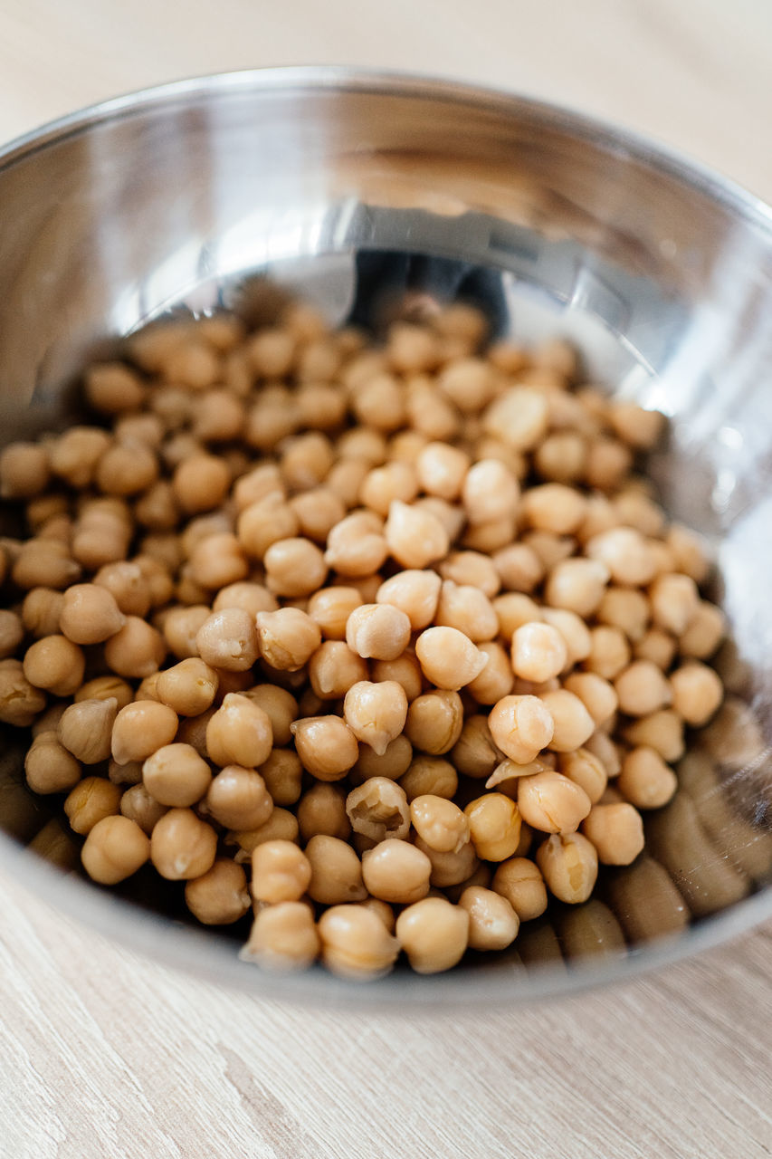 CLOSE-UP OF COFFEE BEANS ON TABLE