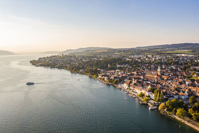 Germany, baden-wurttemberg, uberlingen, aerial view of city on shore of bodensee at sunset