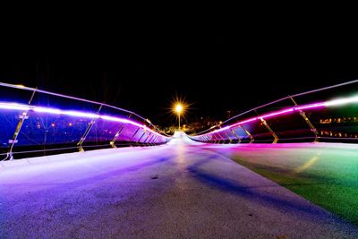 Light trails on road at night