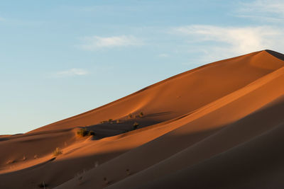 Scenic view of desert against sky