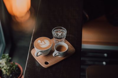 High angle view of coffee cup on table