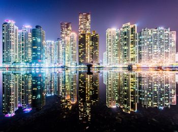 Illuminated cityscape at night