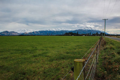 Scenic view of field against sky