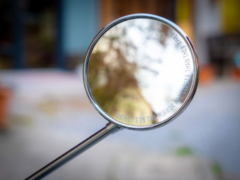 Close-up of sunglasses against blurred background