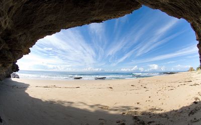 Scenic view of sea and sky seen from cave