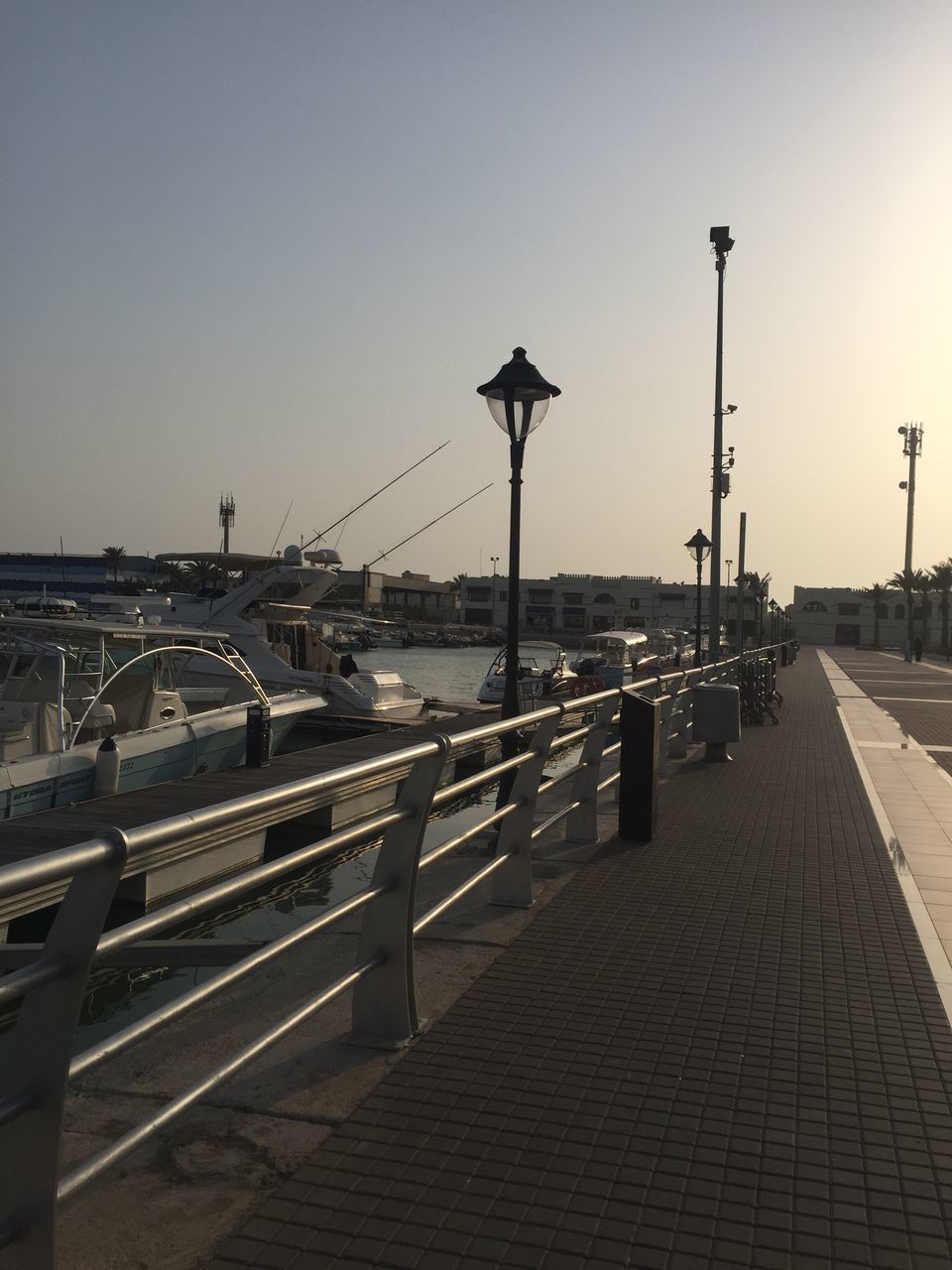 WALKWAY AGAINST SEA AGAINST CLEAR SKY