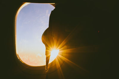 Close-up of sun shining through window