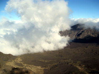 Scenic view of volcanic landscape against sky