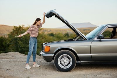 Man holding car