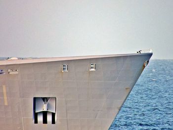 Ship in sea against clear sky