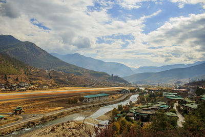 High angle view of road amidst mountains against sky