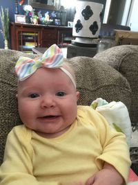 Portrait of cute baby girl at home