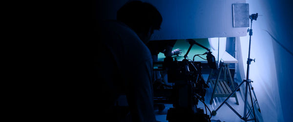 People working in illuminated room