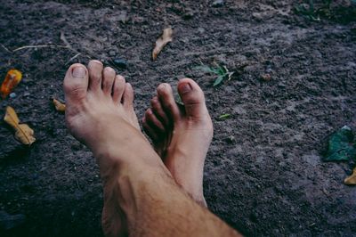Low section of man legs on land